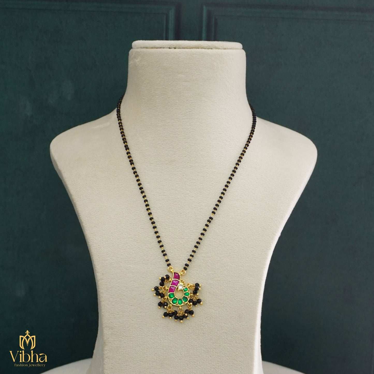 Short Black Beads with Peacock Jadau Kundan Pendant